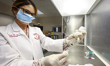 photo of student in pharmacy lab procedure
